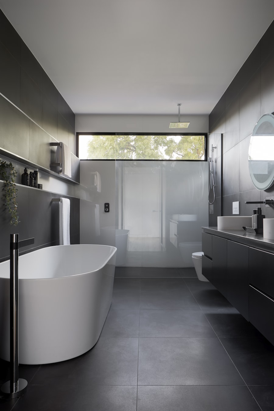 Large-format porcelain tile bathroom with minimal grout lines and clean aesthetic