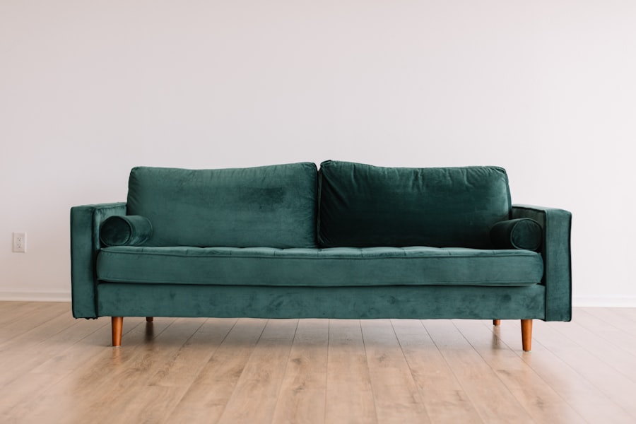Bright minimalist living room with white linen sofa and natural wood coffee table