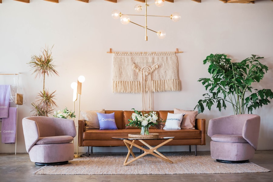 Bright Scandinavian living room with white walls, light wood floors, and sheepskin throws